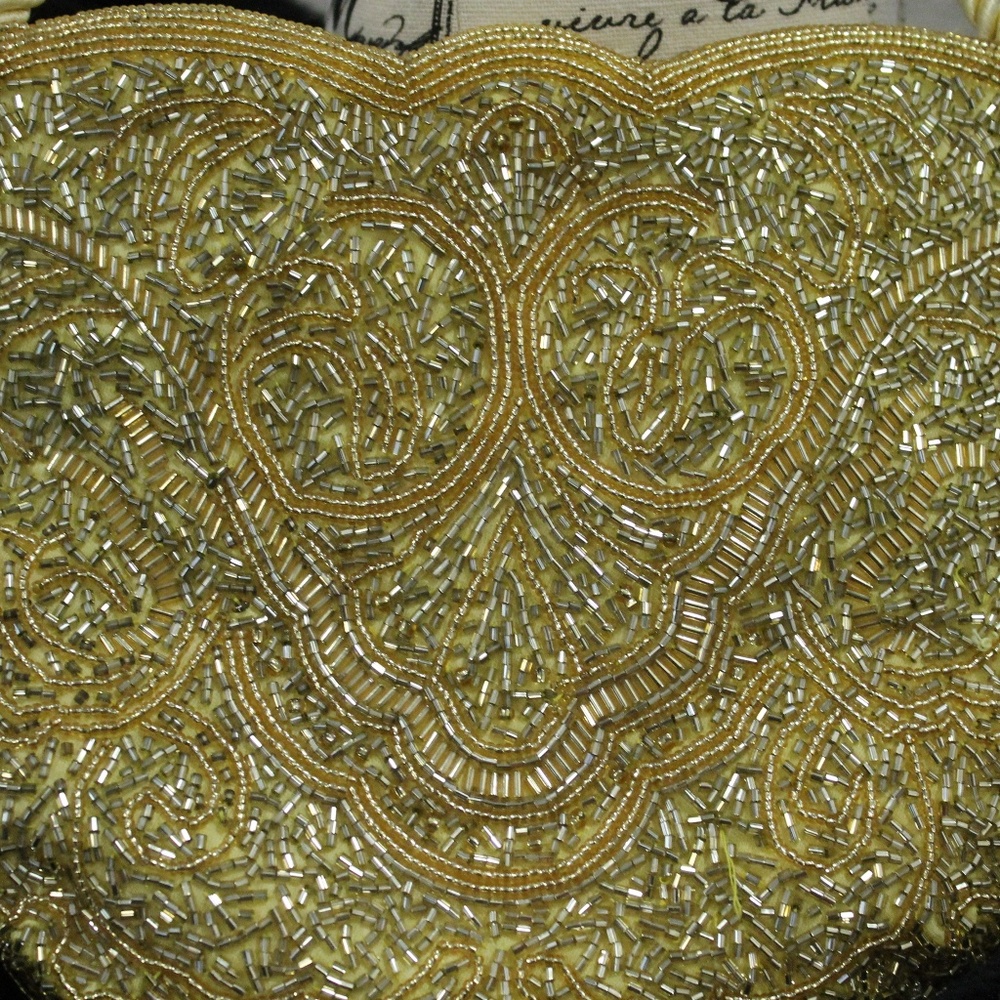Handmade golden beaded handbag
